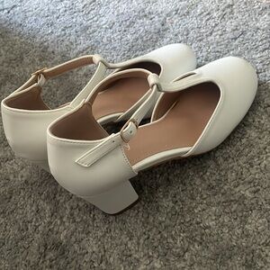 NWOT Peijely Ivory T-Strap Pumps